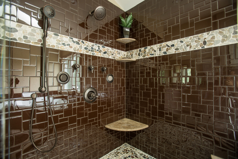 Design ideas for an expansive country master bathroom in New York with an undermount sink, recessed-panel cabinets, grey cabinets, granite benchtops, a curbless shower, a one-piece toilet, brown tile, mosaic tile, beige walls and porcelain floors.