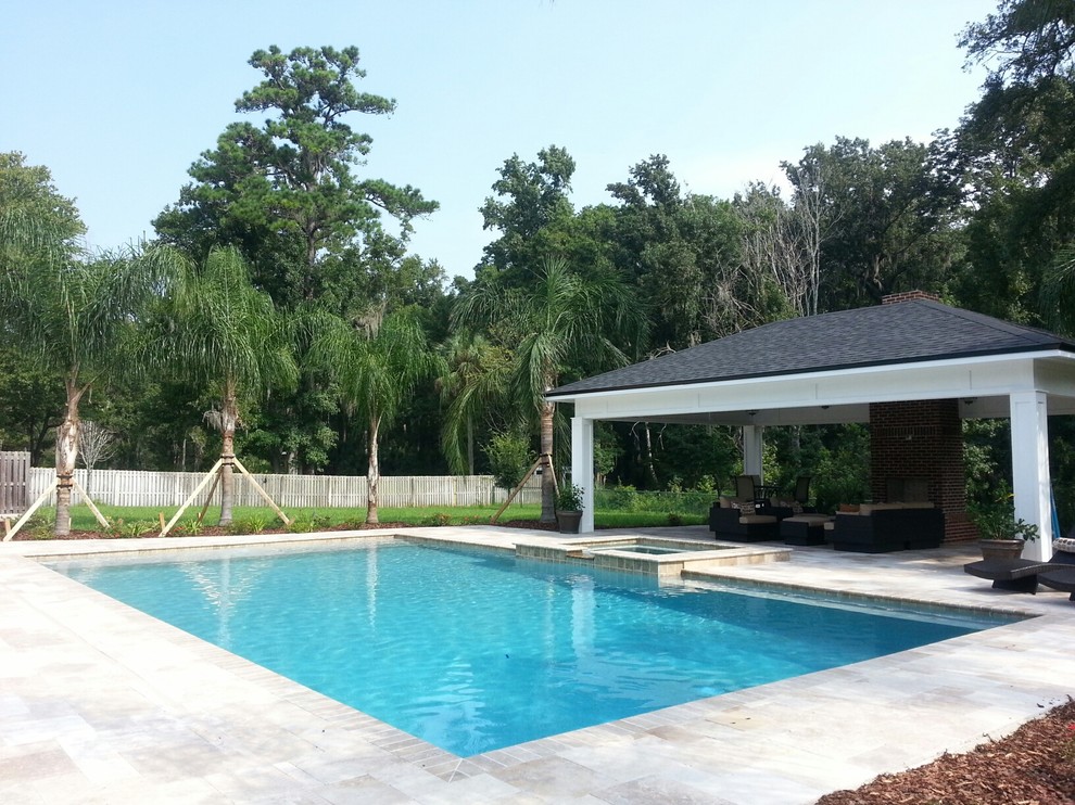 Example of a mid-sized transitional backyard tile and rectangular lap pool house design in Jacksonville