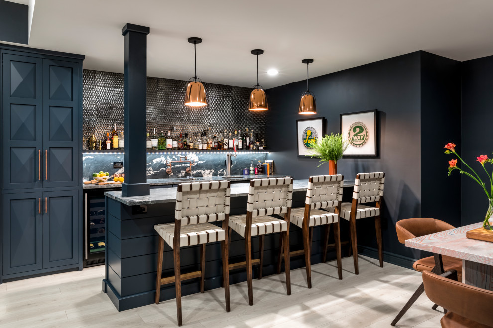 This is an example of a transitional home bar in New York.