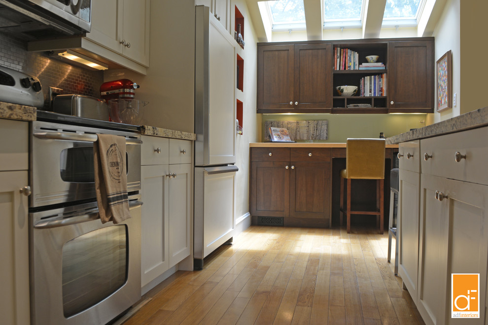 Example of a transitional kitchen design in Toronto