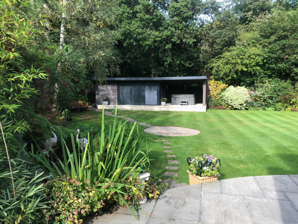 This is an example of a medium sized detached garden shed and building in Surrey.