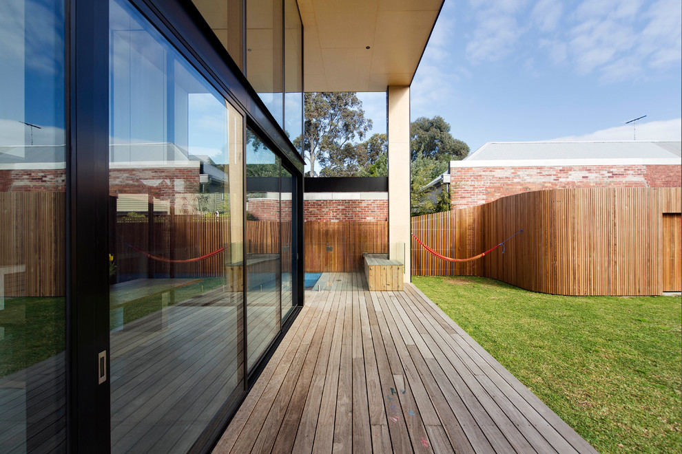 This is an example of a contemporary deck in Melbourne.