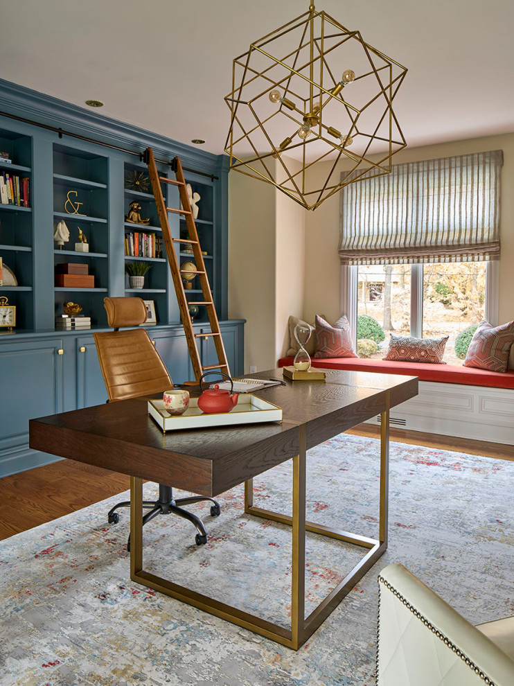Photo of a classic home office in New York with beige walls and a freestanding desk.