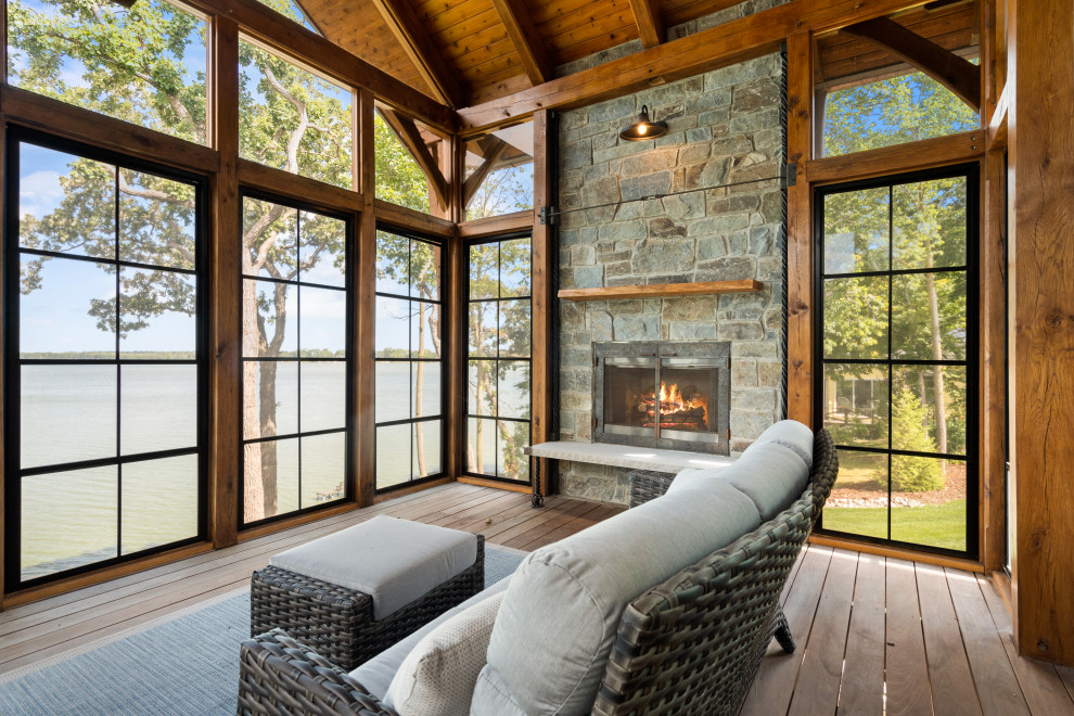 Example of a mountain style home design design in Milwaukee