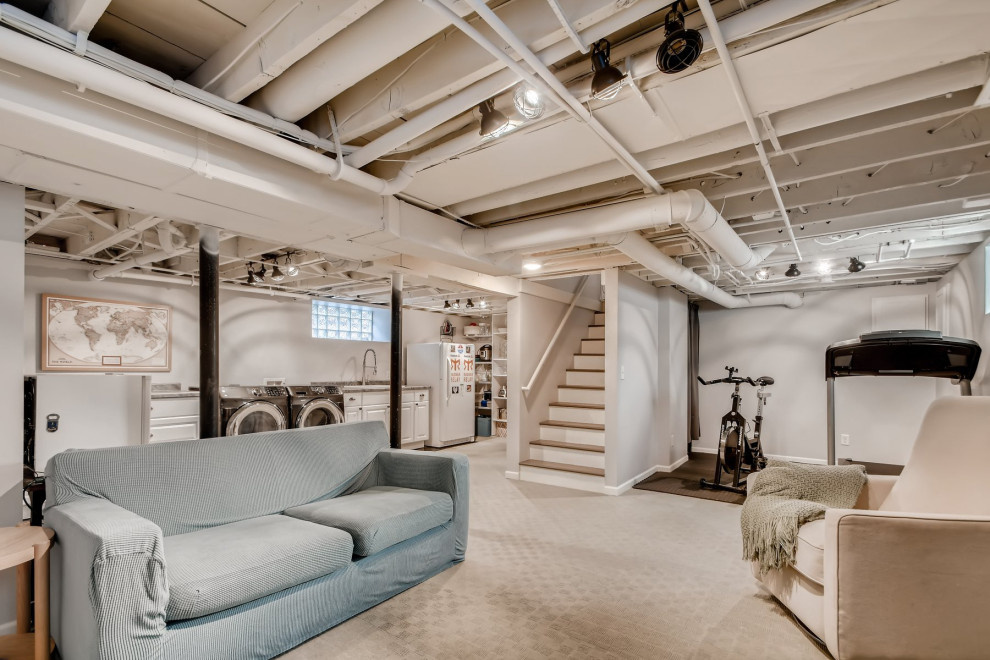 Inspiration for a fully buried basement in Minneapolis with white walls, carpet, grey floor and exposed beam.