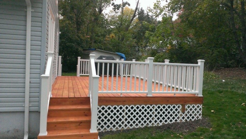 Photo of a small arts and crafts side yard deck in New York with an outdoor kitchen and no cover.