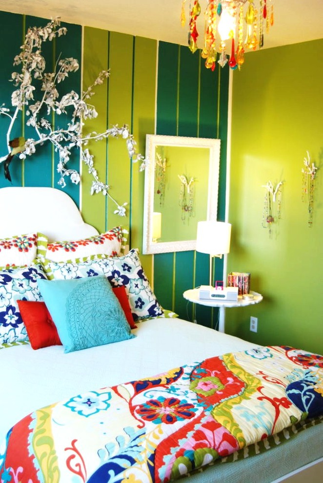 Inspiration for an eclectic bedroom in Boise with green walls.