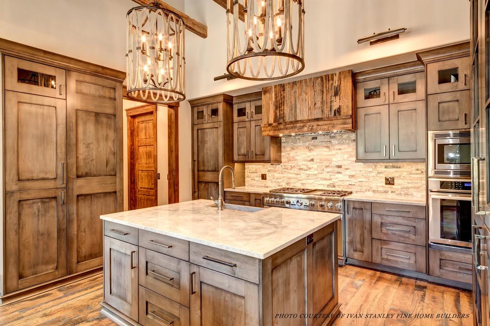 Example of a mountain style kitchen design in Denver