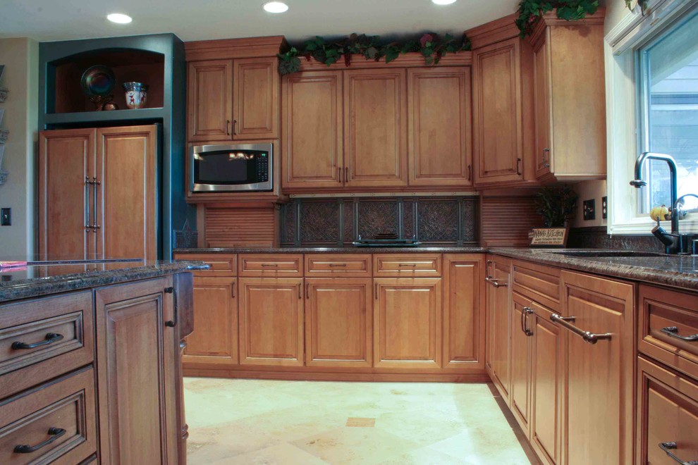 Example of a large transitional l-shaped ceramic tile eat-in kitchen design in Seattle with an undermount sink, medium tone wood cabinets, granite countertops, beige backsplash, ceramic backsplash, stainless steel appliances and an island