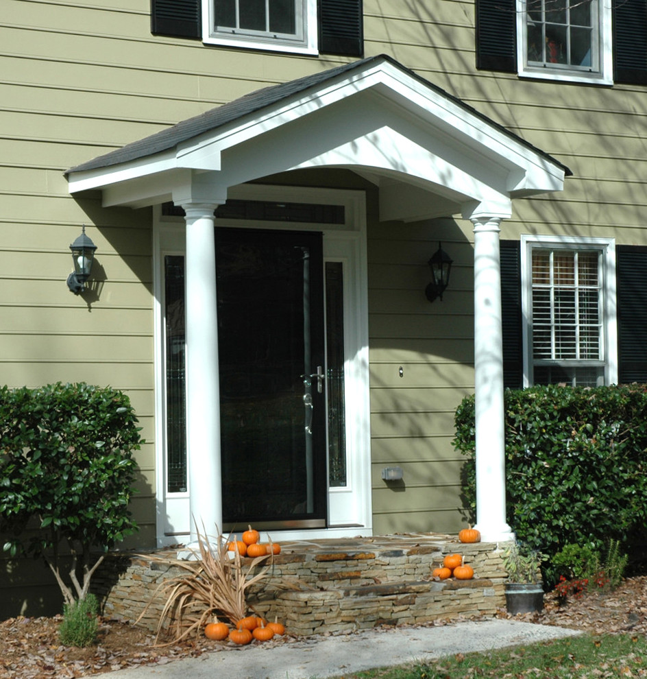 Design ideas for a mid-sized traditional front door in Atlanta with a single front door and a black front door.