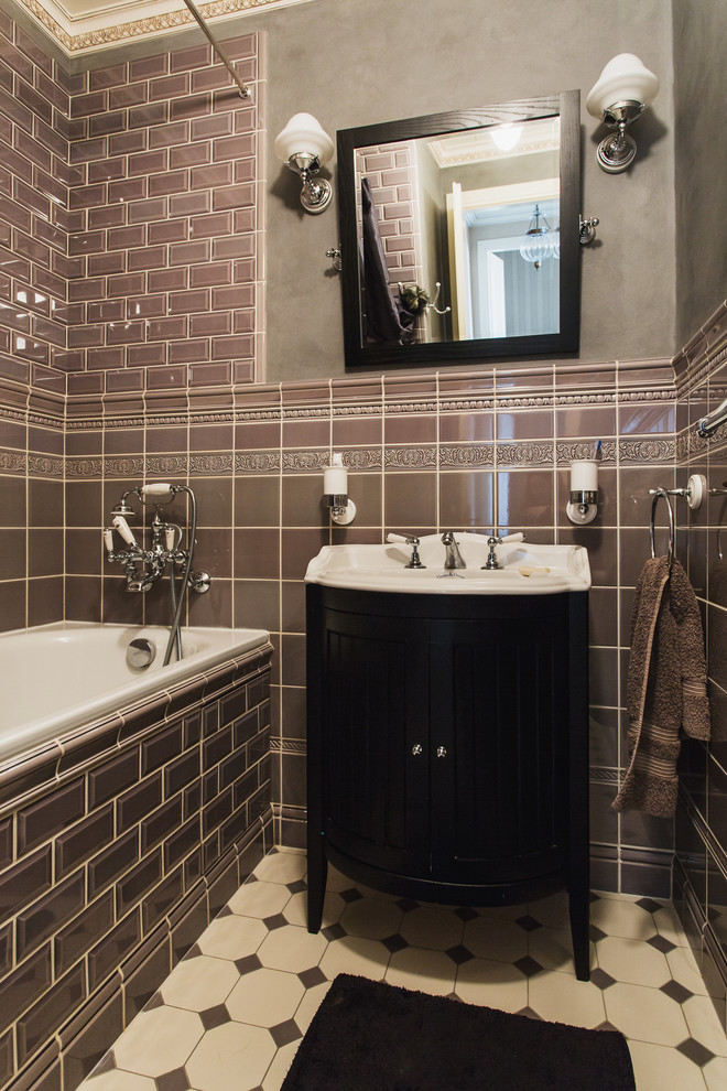 Design ideas for a traditional master bathroom in Moscow with brown tile, subway tile, black cabinets, a drop-in tub, a shower/bathtub combo, grey walls and an integrated sink.