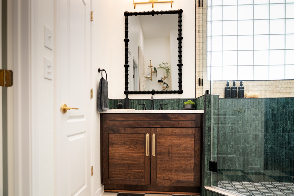 Inspiration for a mid-sized transitional green tile and marble tile marble floor, black floor and double-sink freestanding bathtub remodel in Austin with shaker cabinets, dark wood cabinets, white walls, an undermount sink, quartz countertops, a hinged shower door, white countertops and a built-in vanity