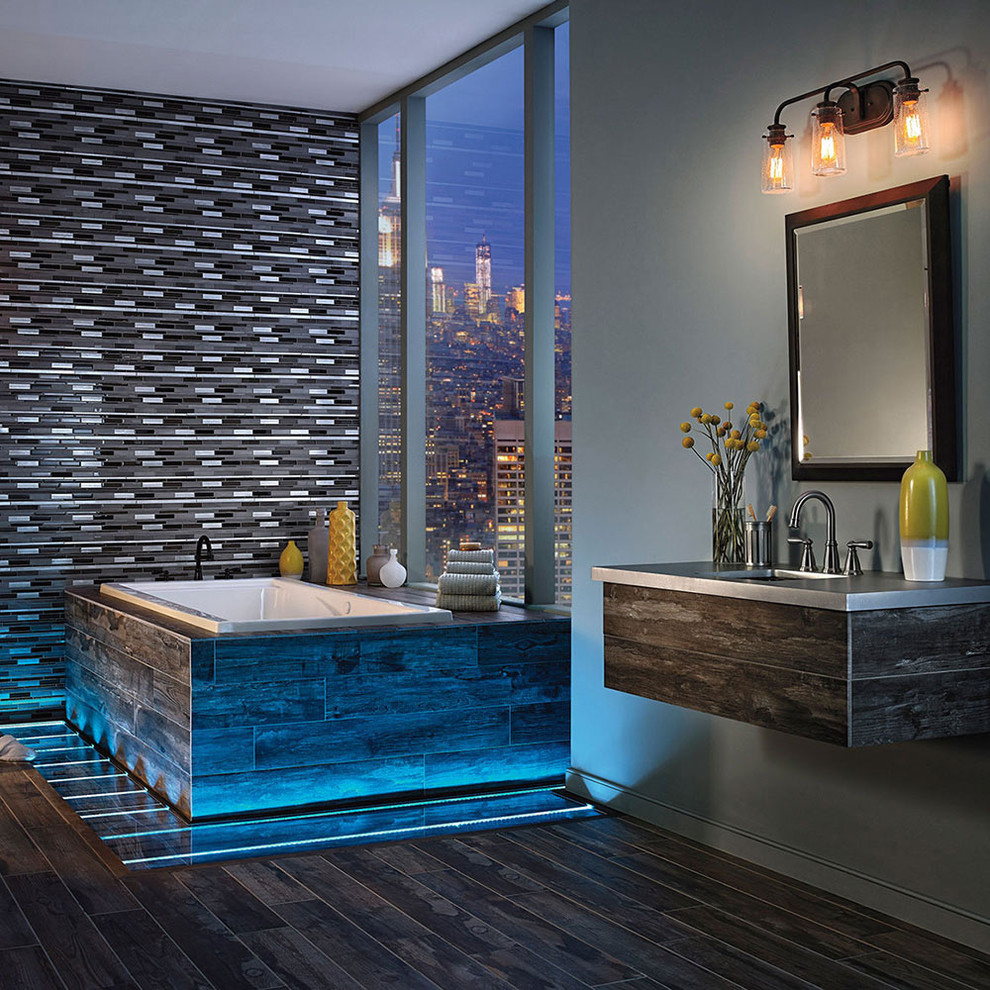 Inspiration for a large contemporary master bathroom in Chicago with a drop-in tub, multi-coloured tile, mosaic tile, grey walls, dark hardwood floors, an undermount sink and zinc benchtops.