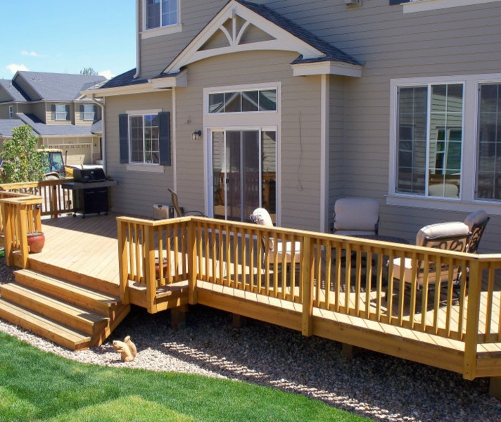 Deck - mid-sized transitional backyard deck idea in Minneapolis with no cover