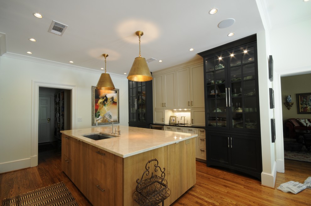 Example of a large transitional u-shaped dark wood floor and brown floor open concept kitchen design in Birmingham with an undermount sink, shaker cabinets, white cabinets, granite countertops, white backsplash, mosaic tile backsplash, paneled appliances and an island