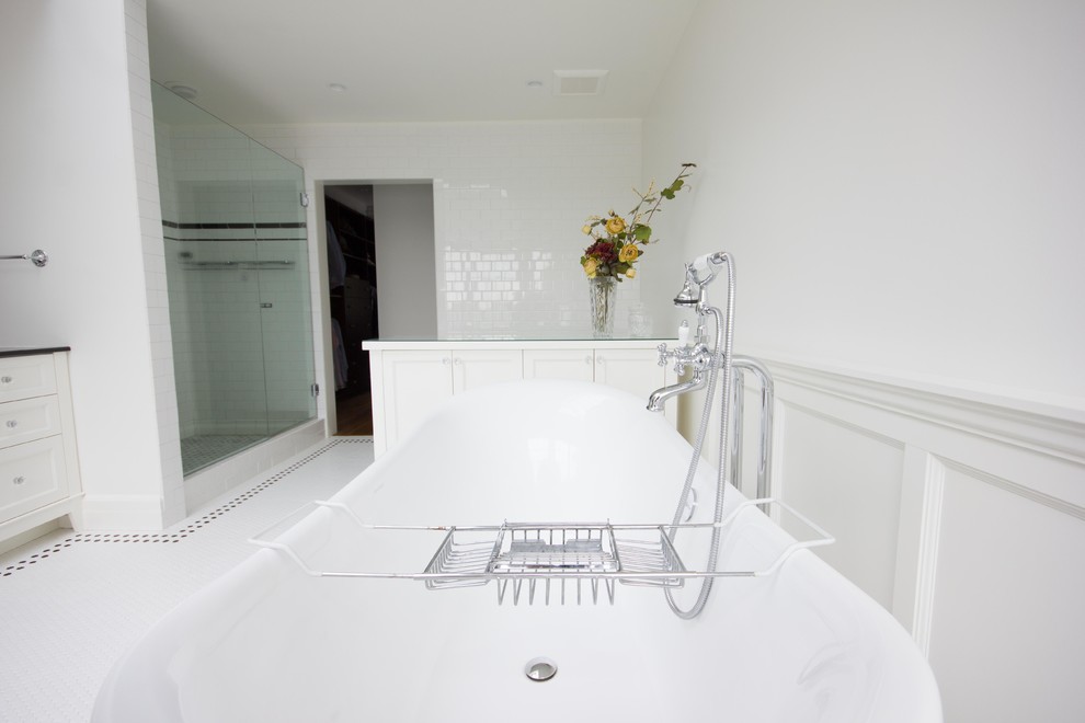 Photo of a large traditional master bathroom in Vancouver with white cabinets, a claw-foot tub, an alcove shower, a one-piece toilet, black and white tile, subway tile, white walls, ceramic floors, a drop-in sink and soapstone benchtops.