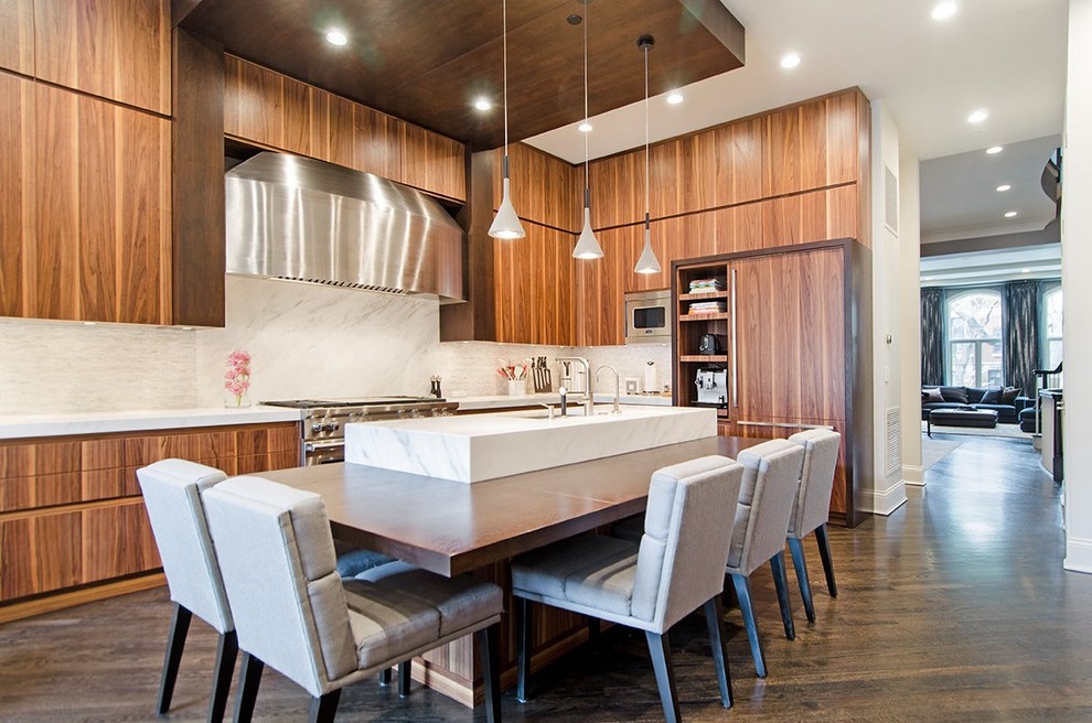 Photo of a contemporary l-shaped kitchen in Chicago with flat-panel cabinets, medium wood cabinets, white splashback, panelled appliances, dark hardwood floors and with island.