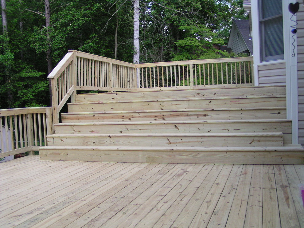Deck - large rustic backyard balcony deck idea in Atlanta with no cover