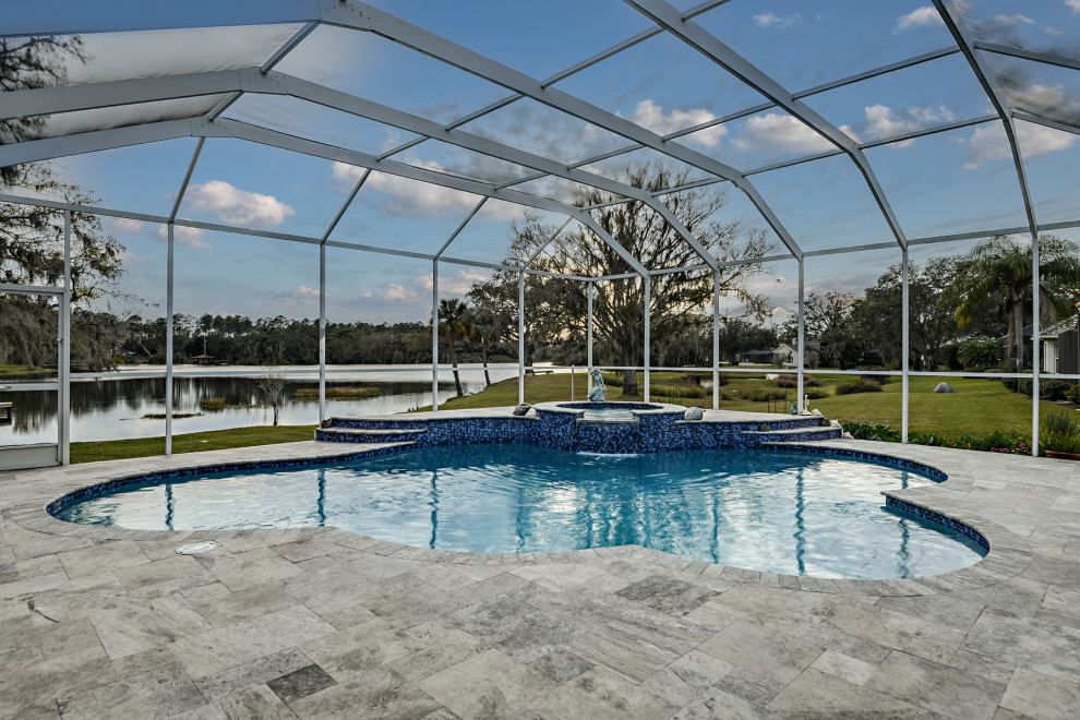 Transitional pool photo in Tampa