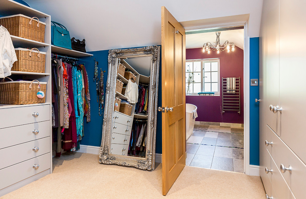 Photo of a large contemporary storage and wardrobe in Surrey.