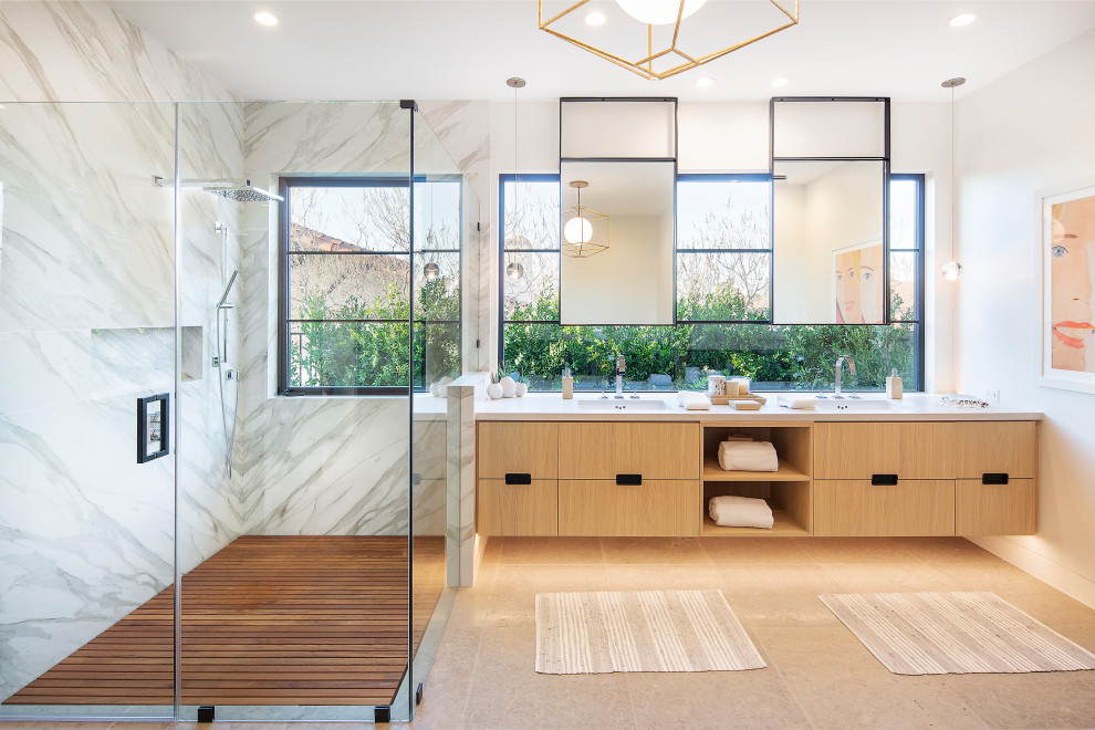 Contemporary master bathroom in Orange County with flat-panel cabinets, a curbless shower, black and white tile, stone slab, white walls, an undermount sink, quartzite benchtops, a hinged shower door, white benchtops, light wood cabinets, beige floor, a double vanity and a floating vanity.