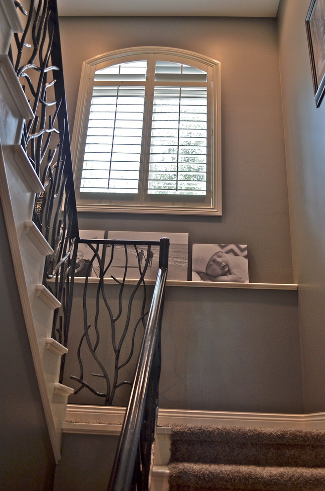 Staircase - rustic staircase idea in Omaha