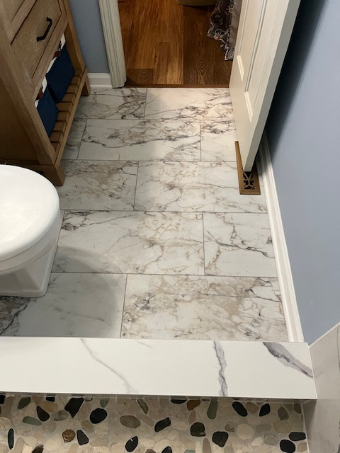 Bathroom with full tile shower