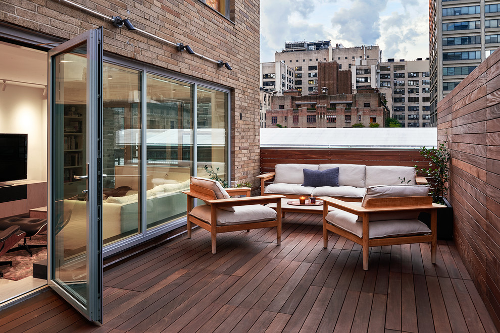 Design ideas for a contemporary deck in New York with a container garden and no cover.