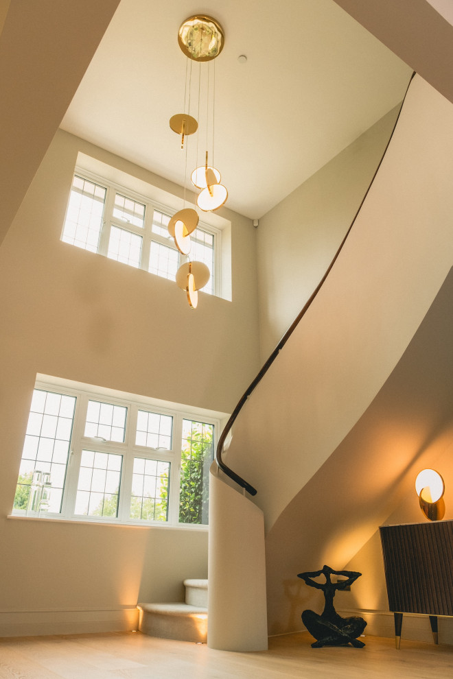 Inspiration for a transitional staircase in Surrey.