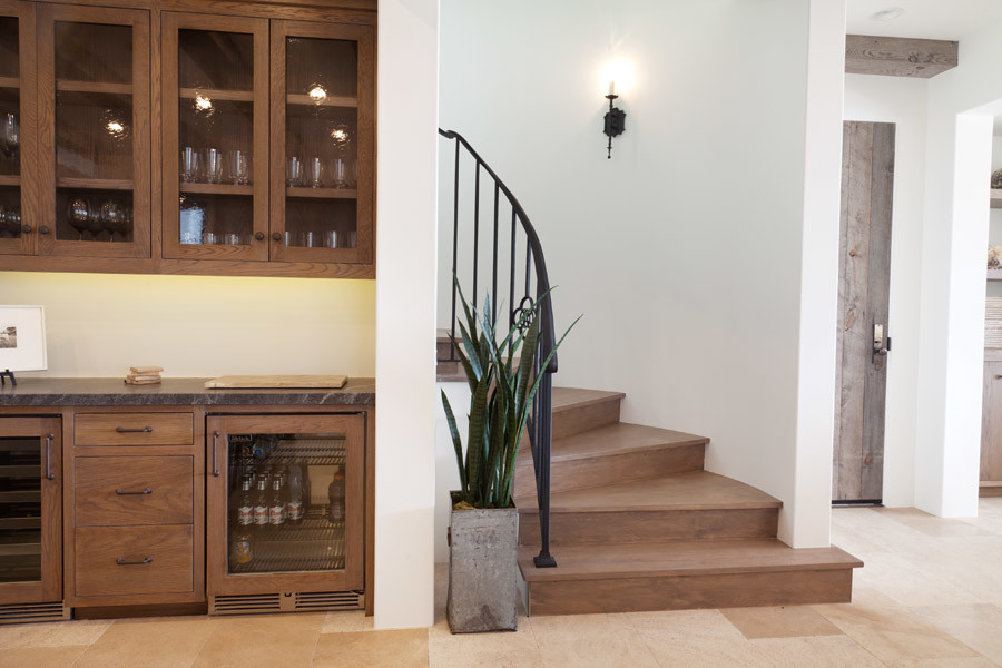Photo of a beach style curved staircase in Orange County.