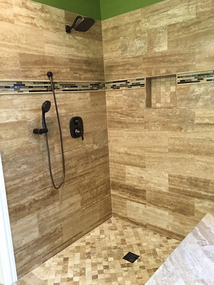 Inspiration for a mid-sized transitional 3/4 brown tile and porcelain tile bathroom remodel with green walls