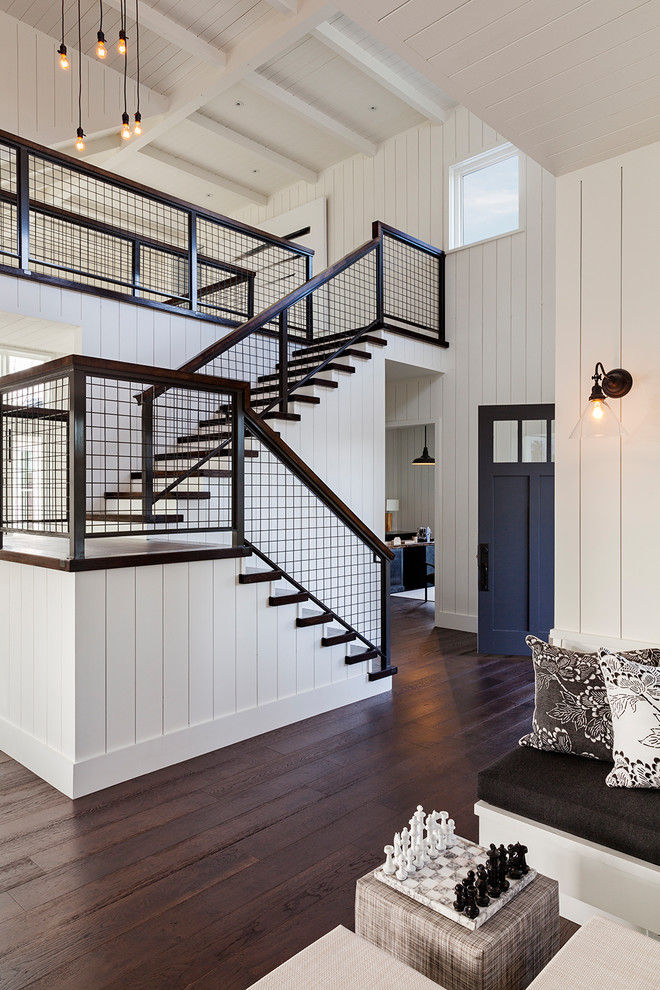 Inspiration for a mid-sized industrial wood l-shaped staircase in San Francisco.