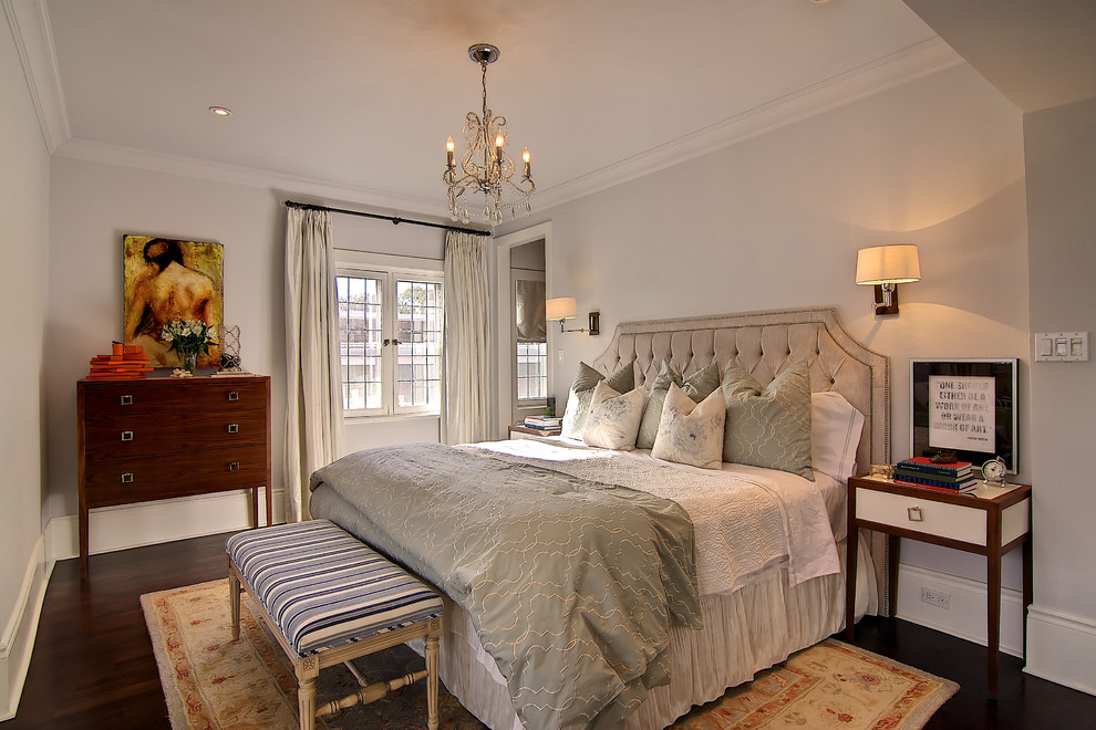 Large trendy dark wood floor bedroom photo in Vancouver with white walls