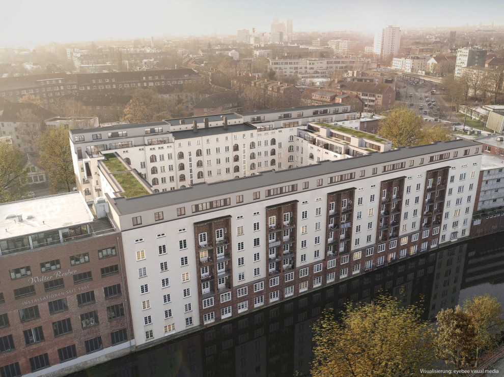 Großes Modernes Haus mit Putzfassade, weißer Fassadenfarbe, Flachdach und grauem Dach in Hamburg