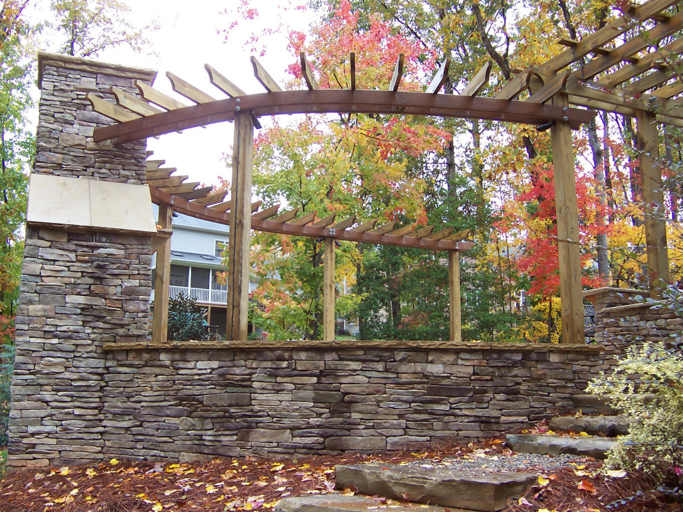 Mountain style home design photo in Raleigh