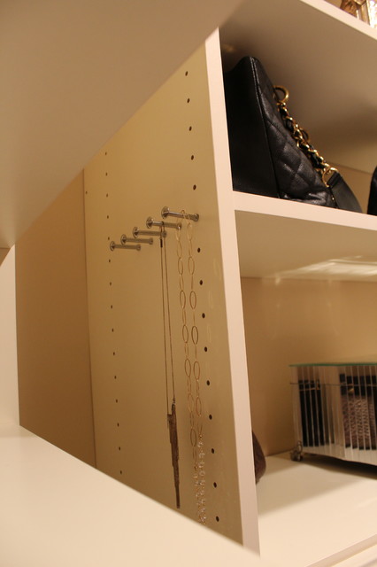 A place to hang long necklaces! traditional-cabinet