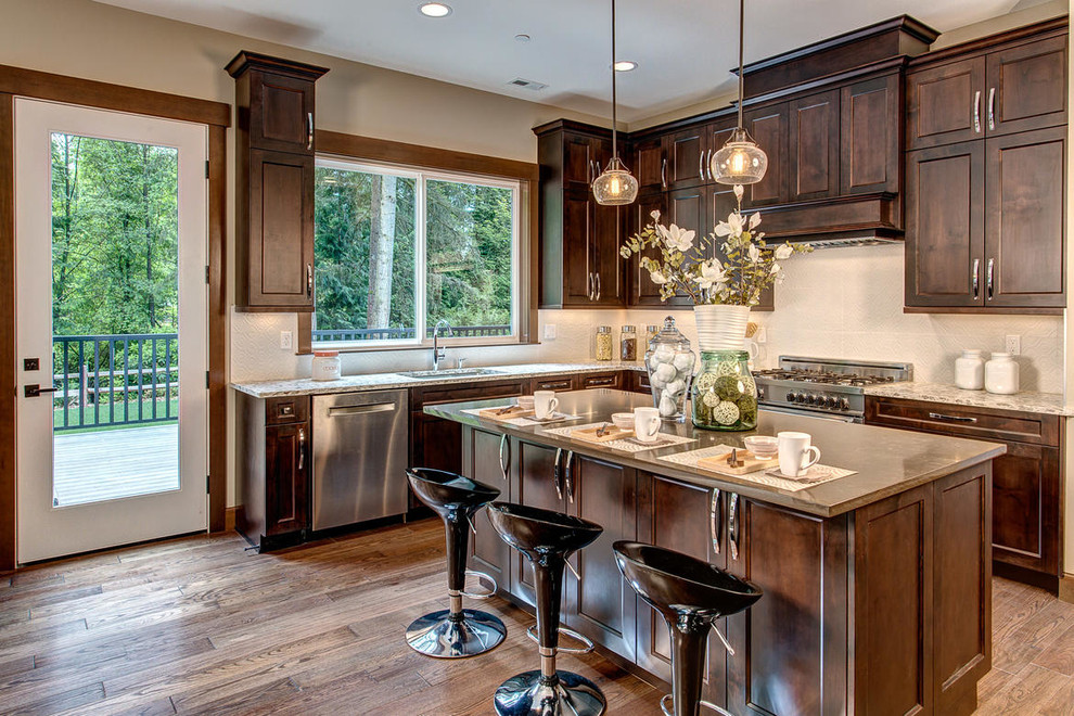 This is an example of a transitional kitchen in Seattle.