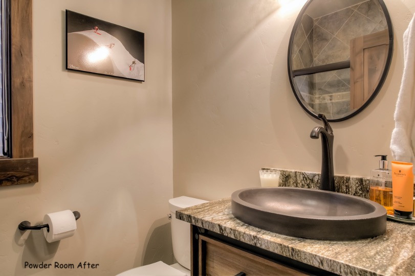 This is an example of a transitional powder room in Denver.