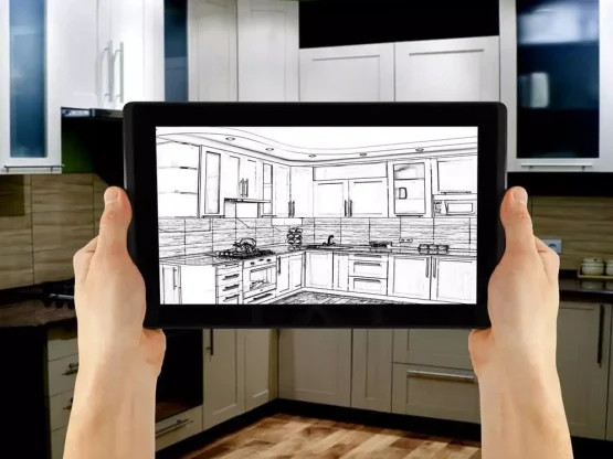 Person holding ipad in front kitchen AR blueprint