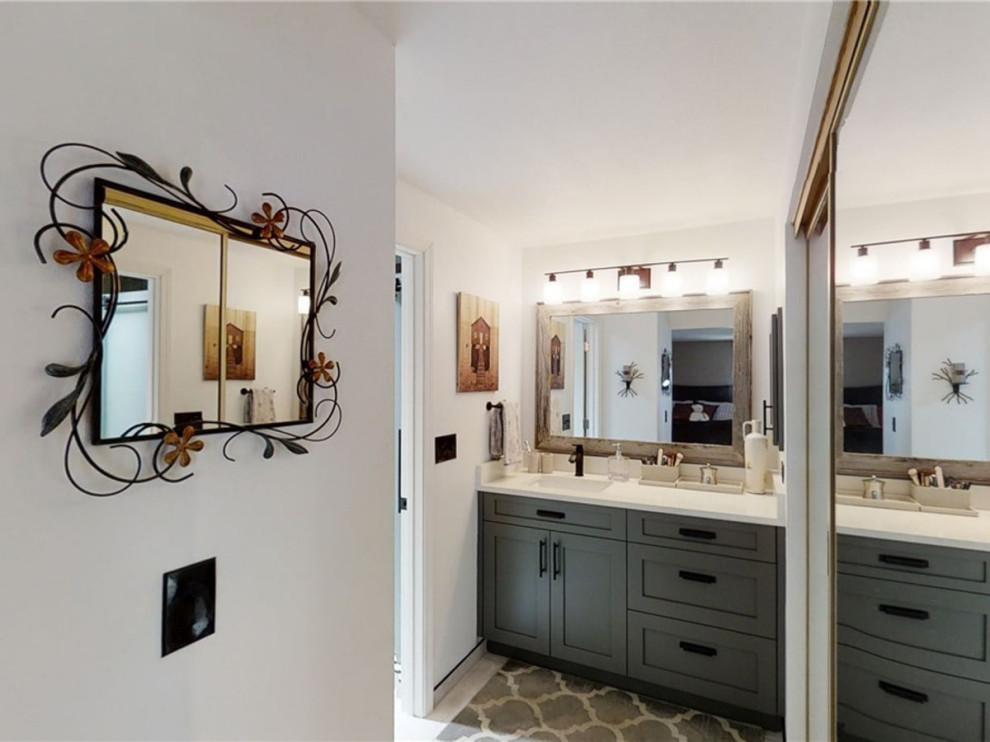 Example of a mid-sized minimalist master white tile and marble tile porcelain tile, brown floor, single-sink, shiplap ceiling and shiplap wall bathroom design in Seattle with shaker cabinets, light wood cabinets, an undermount tub, a bidet, white walls, an undermount sink, marble countertops, white countertops and a built-in vanity