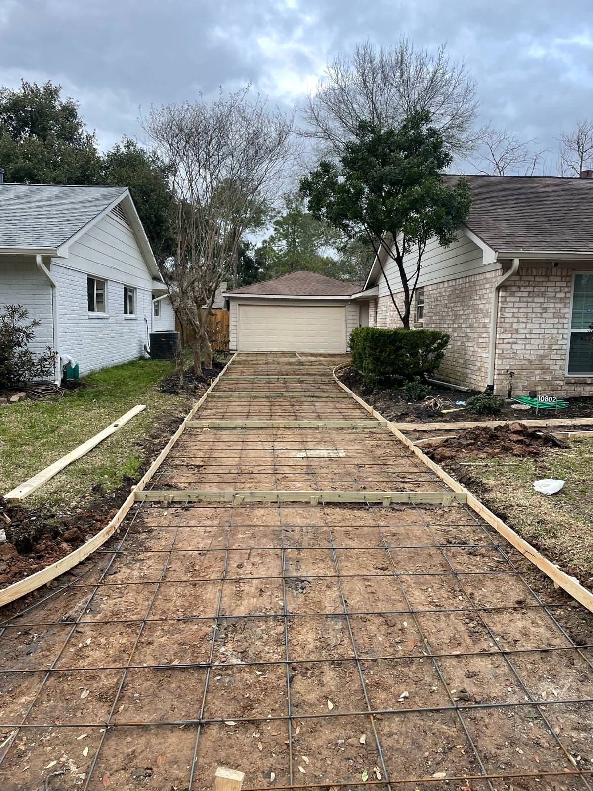 New driveway with sidewalks and stamped concrete!