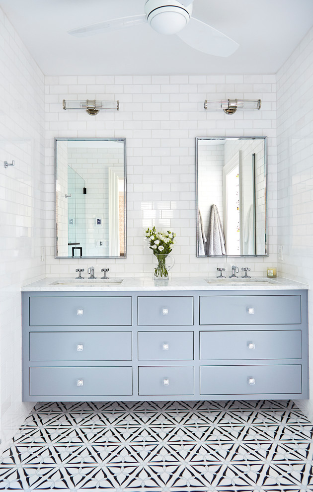 Mid-sized transitional master bathroom in Wilmington with flat-panel cabinets, grey cabinets, an alcove shower, white tile, ceramic tile, marble floors, an undermount sink, marble benchtops, a hinged shower door, white benchtops and multi-coloured floor.