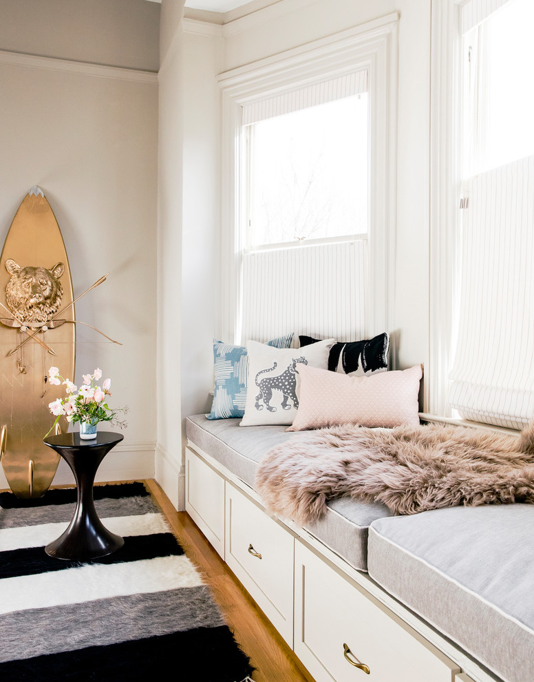 Inspiration for a mid-sized traditional gender-neutral kids' playroom for kids 4-10 years old in San Francisco with grey walls, light hardwood floors and brown floor.
