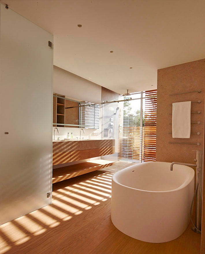 Inspiration for a large contemporary master bathroom remodel in New York with an integrated sink