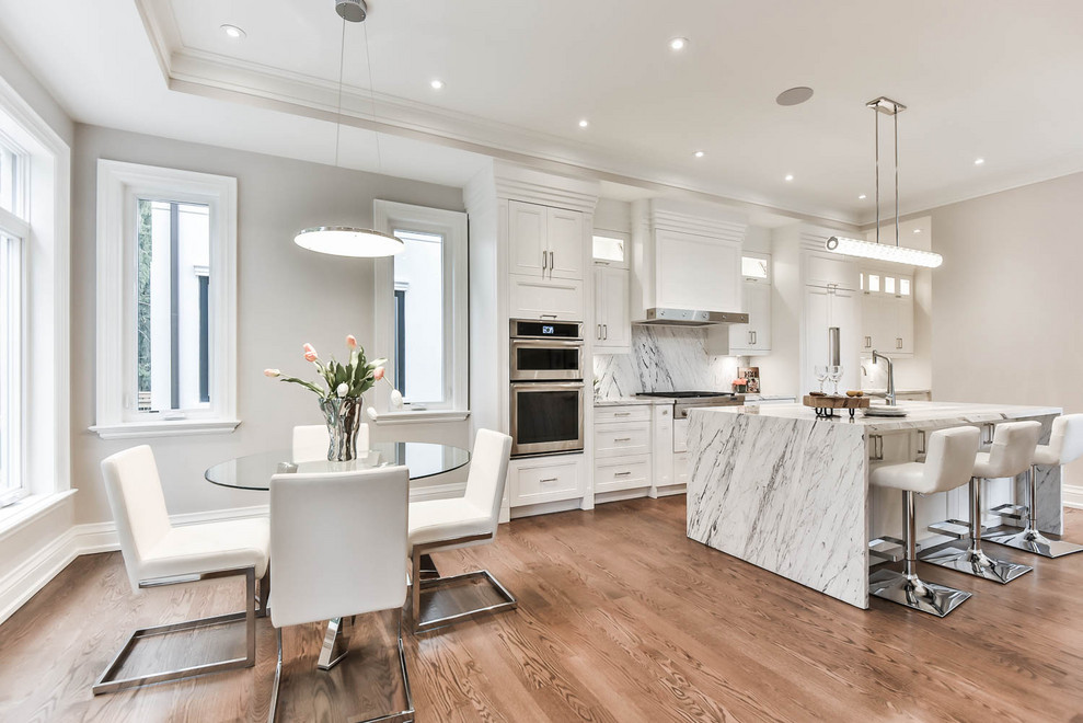 Example of a transitional kitchen design in Toronto