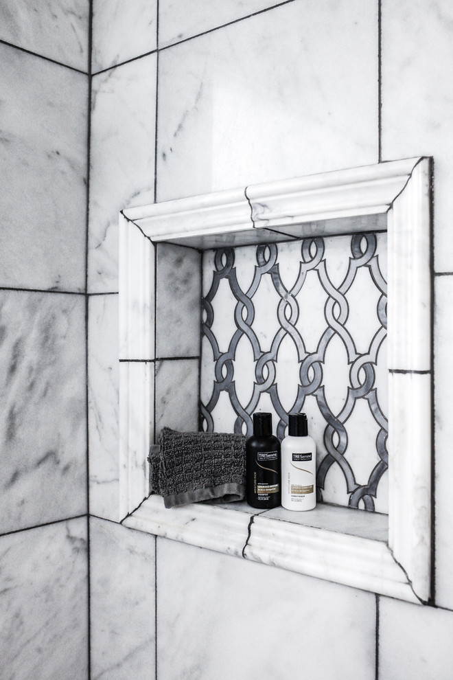 Alcove bathtub - small transitional master gray tile and marble tile marble floor and gray floor alcove bathtub idea with furniture-like cabinets, white cabinets, a two-piece toilet, gray walls, a console sink, quartz countertops and white countertops