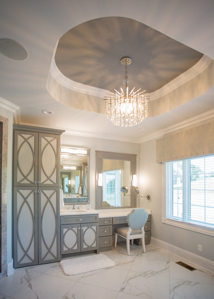Inspiration for a transitional master bathroom in Other with recessed-panel cabinets, grey walls and marble floors.