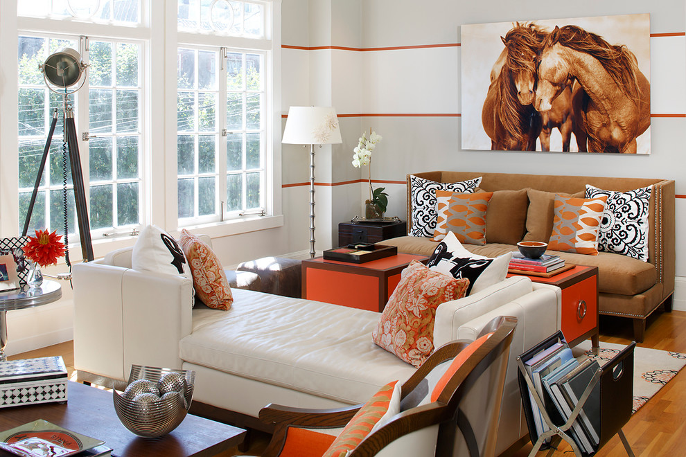 This is an example of a contemporary living room in San Francisco with medium hardwood floors and orange floor.
