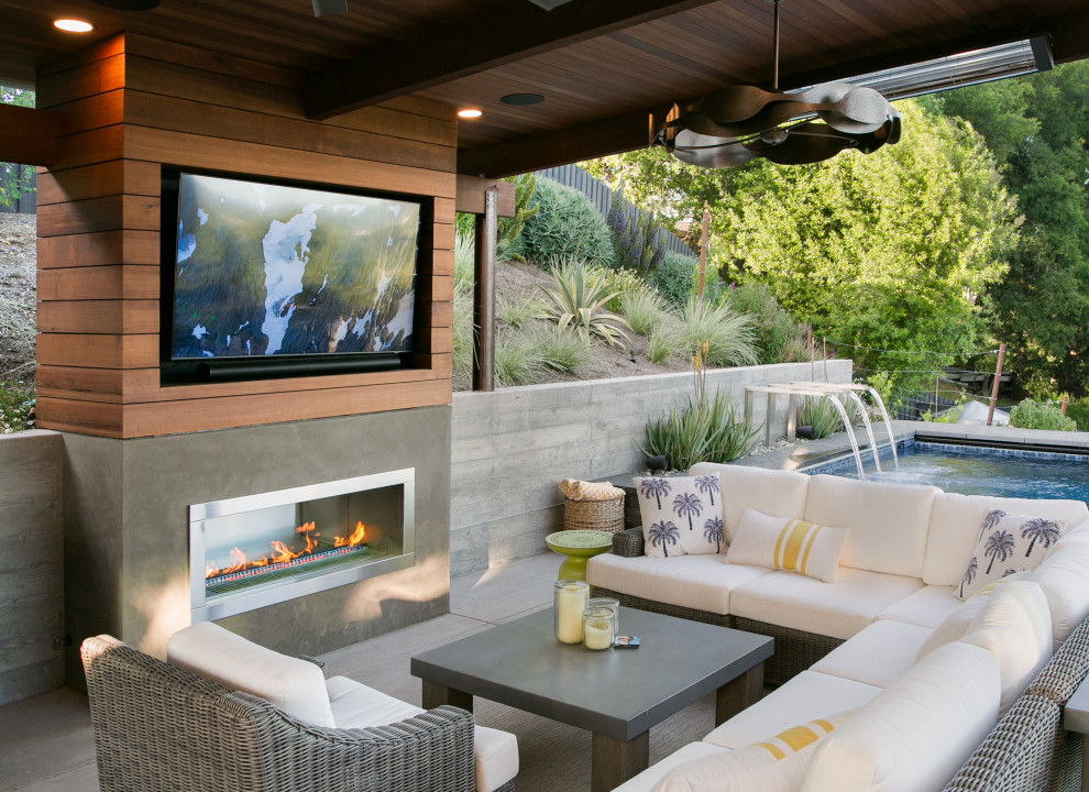 Trendy patio photo in San Francisco with a fireplace