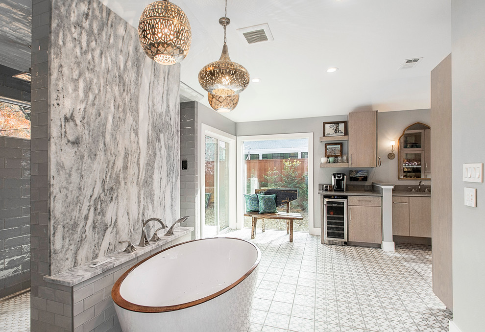 Inspiration for a large eclectic master bathroom in Dallas with flat-panel cabinets, light wood cabinets, a freestanding tub, an open shower, a two-piece toilet, gray tile, cement tile, grey walls, cement tiles, an undermount sink and quartzite benchtops.